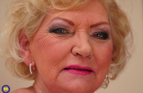 Mature NL photo collection featuring miss in sex scene with boy